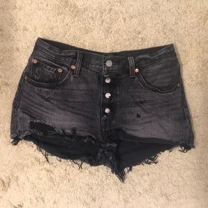 Levi’s 501 Cutoff Shorts in Shredded Onyx